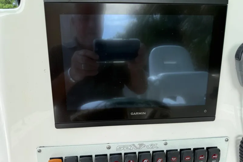 Slide: The Image of Garmin display on 2013 Sea Fox 286 Center Console boat dashboard. - 8