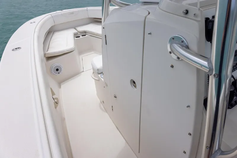 Slide: The Image of 2011 Jupiter 26 FS boat interior with seating and stainless steel railing. - 18