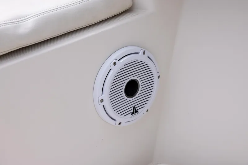 Slide: The Image of White speaker on a 2011 Jupiter 26 FS boat interior. - 21
