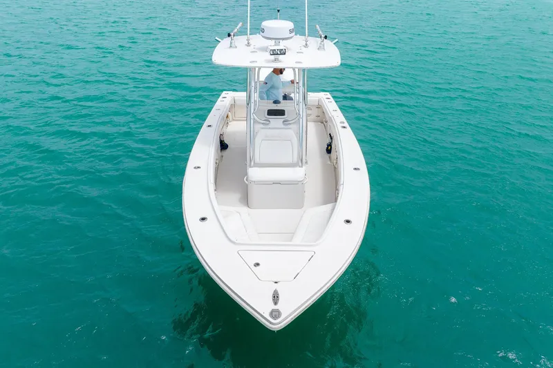 Slide: The Image of 2011 Jupiter 26 FS boat on clear turquoise water, aerial view. - 29