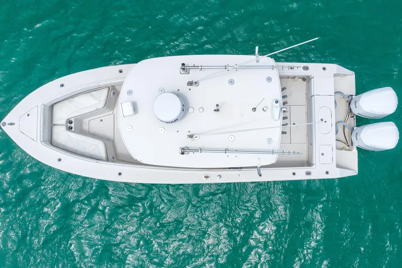 Slide: The Image of Aerial view of 2011 Jupiter 26 FS boat on turquoise water. - 30