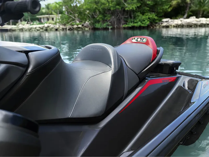 Slide: The Image of 2024 Sea-Doo GTR-X 300 iBR jet ski by the water. - 5