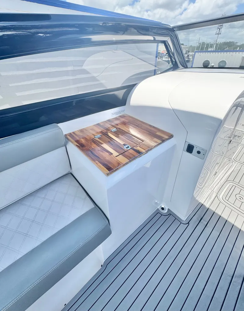 Slide: The Image of Interior of 2024 L'acqua Royale LR280 GRAN CABRIO with wooden table and seating. - 21