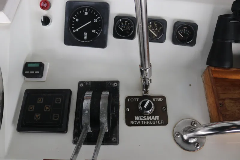 Slide: The Image of Control panel with gauges and Wesmar bow thruster, Cooper Prowler Sedan, 1990 model. - 27
