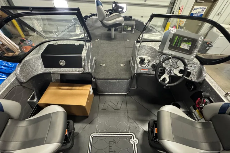 Slide: The Image of 2026 Nitro ZV19 Sport Pro boat interior with modern dashboard and seating. - 14