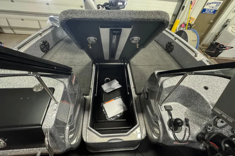 Slide: The Image of 2026 Nitro ZV19 Sport Pro boat interior with open storage compartments. - 15