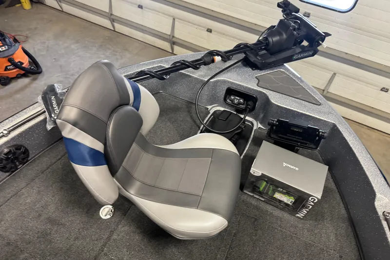 Slide: The Image of 2026 Nitro ZV19 Sport Pro boat interior with Garmin equipment and cushioned seat. - 18
