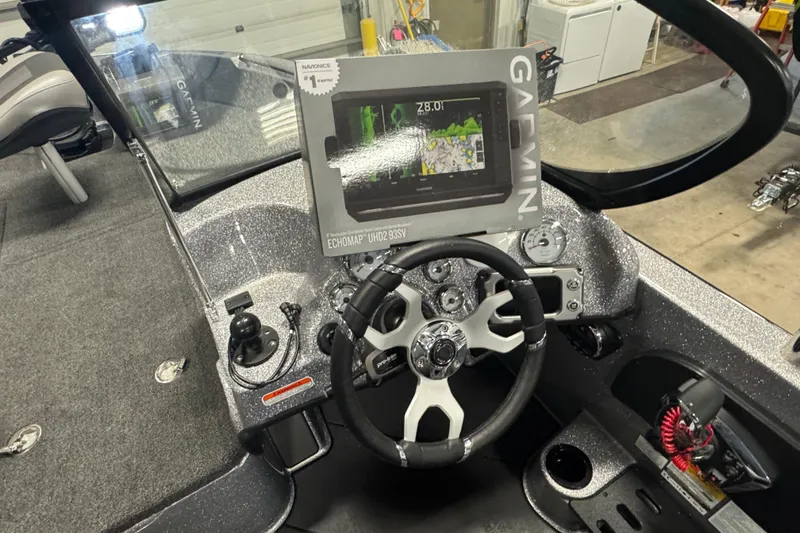 Slide: The Image of 2026 Nitro ZV19 Sport Pro boat dashboard with Garmin ECHOMAP UHD2 93SV display. - 8