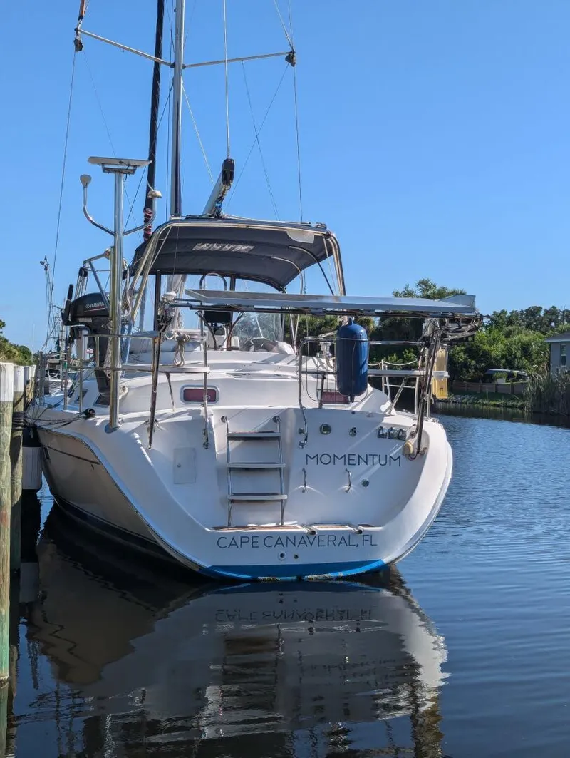 Slide: The Image of Hunter 45 Center Cockpit sailboat, 2007 model, docked in Cape Canaveral, Florida. - 24