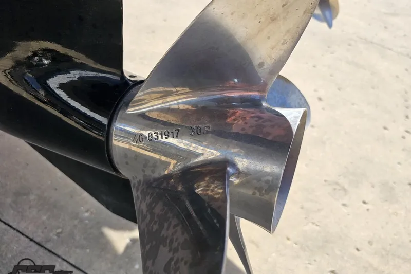 Slide: The Image of Close-up of a 2001 Formula 382 FASTech boat propeller with engraved serial number. - 102