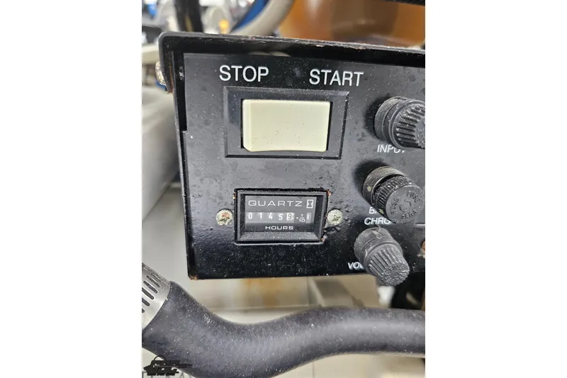 Slide: The Image of Control panel of a 2001 Formula 382 FASTech boat with hour meter display. - 104