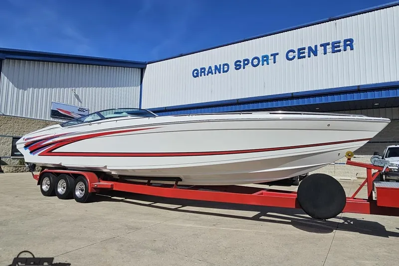 Slide: The Image of 2001 Formula 382 FASTech boat on trailer at Grand Sport Center. - 16