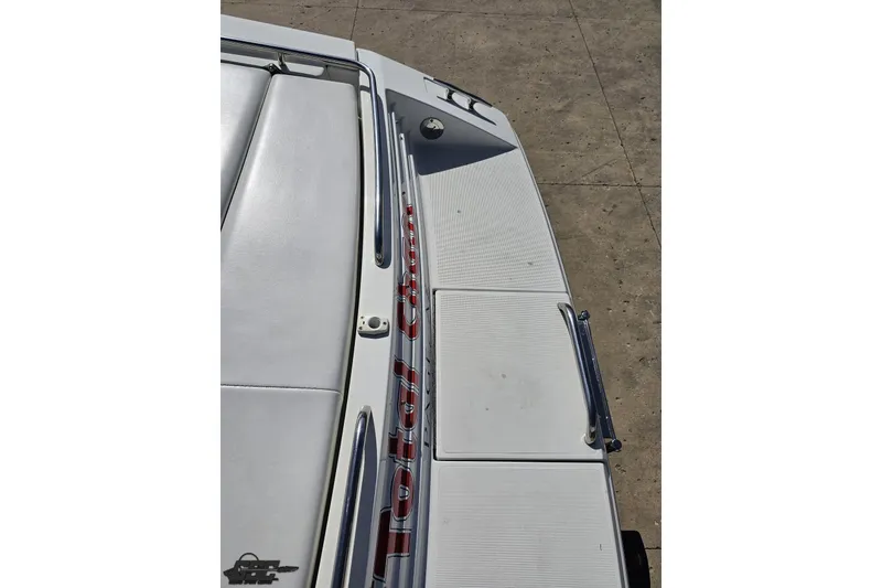 Slide: The Image of 2001 Formula 382 FASTech boat deck with sleek design and chrome accents. - 34