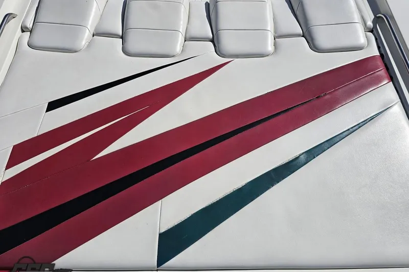 Slide: The Image of White and red upholstery with geometric design on a 2001 Formula 382 FASTech boat. - 37