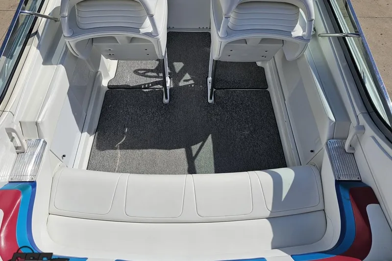 Slide: The Image of 2001 Formula 382 FASTech boat interior with white seating and carpeted floor. - 42