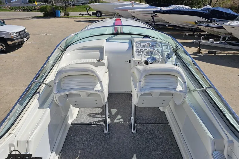 Slide: The Image of 2001 Formula 382 FASTech boat interior with dual seats and control panel. - 43