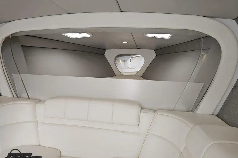 Slide: The Image of Interior of 2001 Formula 382 FASTech boat with white leather seating and modern design. - 59