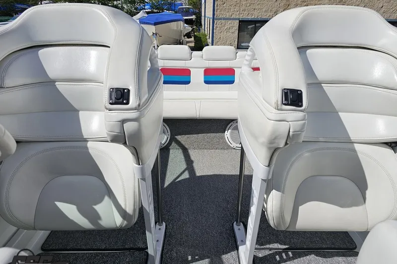 Slide: The Image of Interior of a 2001 Formula 382 FASTech boat with white leather seats. - 81