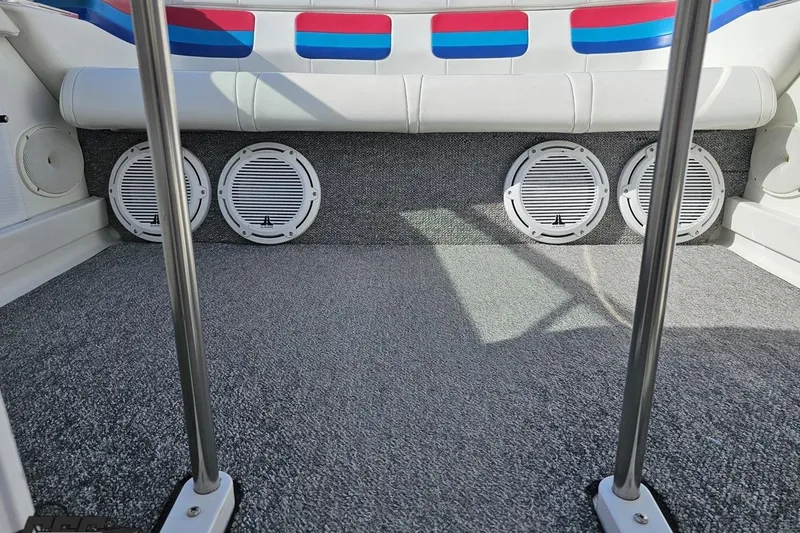 Slide: The Image of 2001 Formula 382 FASTech boat interior with speakers and carpeted flooring. - 83