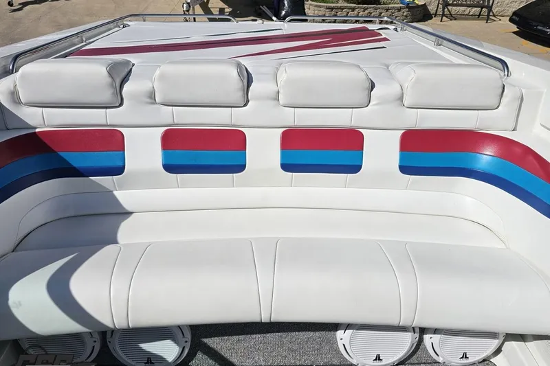 Slide: The Image of 2001 Formula 382 FASTech boat interior with white, red, and blue seating design. - 87