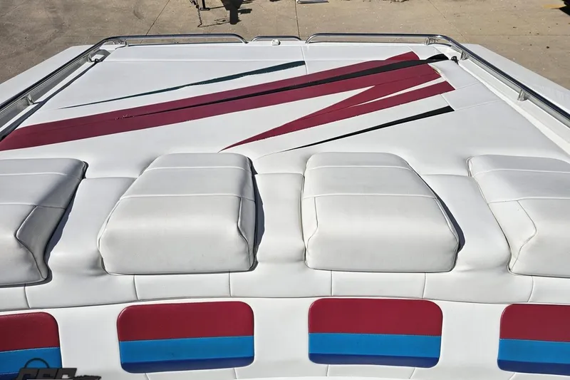 Slide: The Image of 2001 Formula 382 FASTech boat with white and red cushioned seating. - 88