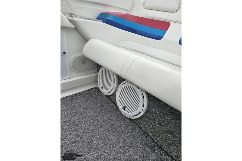 Slide: The Image of 2001 Formula 382 FASTech boat interior with speakers and colorful seating. - 89