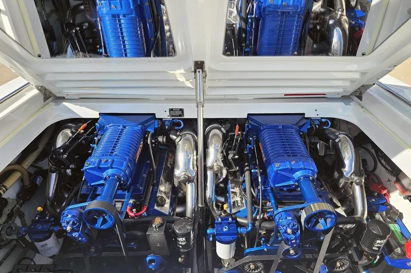 Slide: The Image of Engine compartment of a 2001 Formula 382 FASTech with dual blue supercharged engines. - 95
