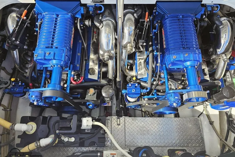 Slide: The Image of Engine compartment of a 2001 Formula 382 FASTech with dual blue superchargers. - 96