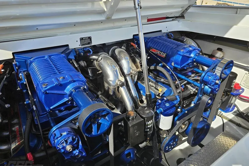 Slide: The Image of 2001 Formula 382 FASTech engine with blue superchargers and polished components. - 97