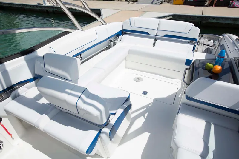 Slide: The Image of Manufacturer Provided Image: 2016 Formula 310 Bowrider interior with white and blue seating. - 7