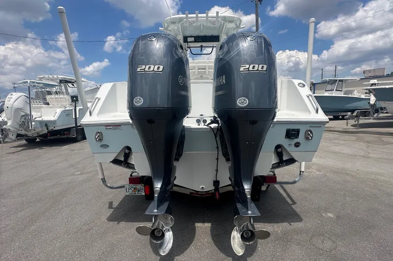 Slide: The Image of 2019 Sea Hunt Gamefish 27 Coffin Box with twin Yamaha 200 engines, rear view. - 3