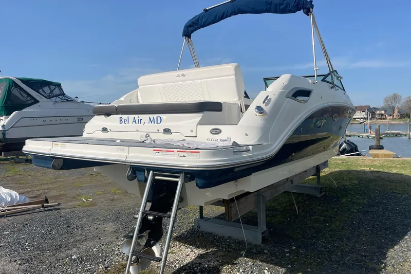 Slide: The Image of 2019 Sea Ray SDX 250 boat on a stand, Bel Air, MD, near waterfront. - 5