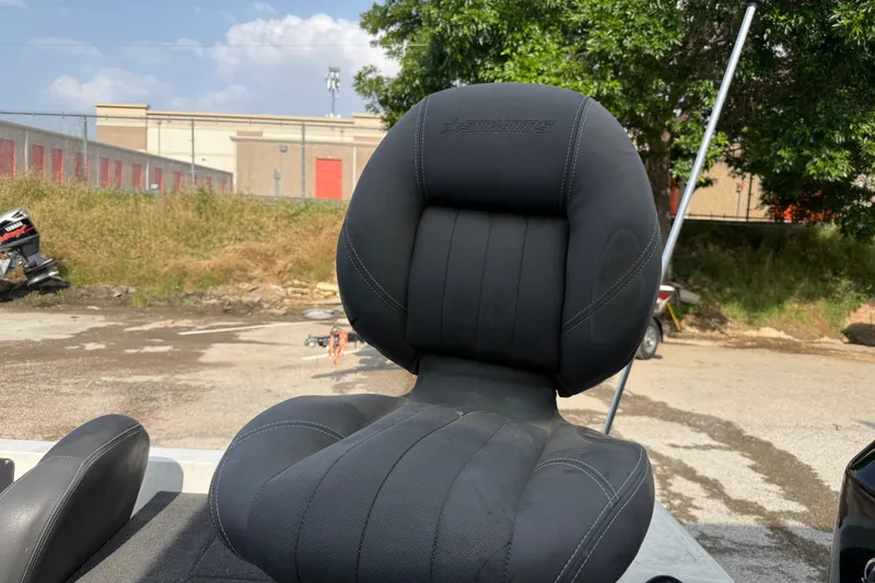 Slide: The Image of Black Stratos 176 VLO boat seat, 2016 model, outdoors with trees and buildings. - 14