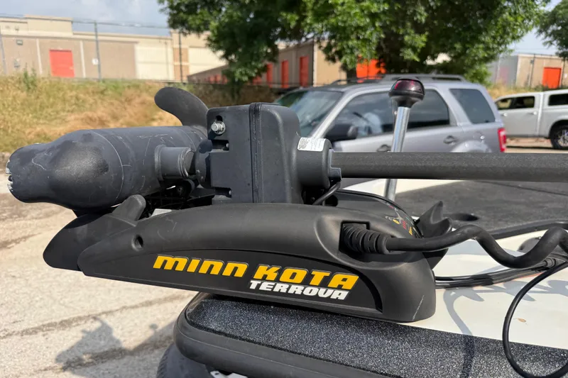 Slide: The Image of Minn Kota Terrova trolling motor on 2016 Stratos 176 VLO boat, parked outdoors. - 18