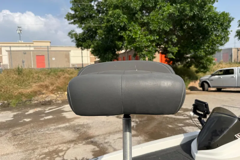 Slide: The Image of Gray seat on 2016 Stratos 176 VLO boat, outdoor setting with trees and buildings. - 22