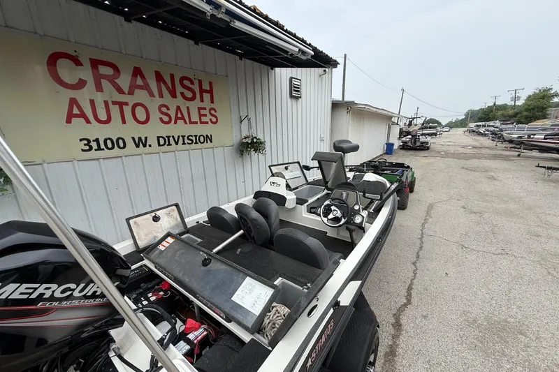 Slide: The Image of 2016 Stratos 176 VLO boat with Mercury engine at lakeside dock. - 31