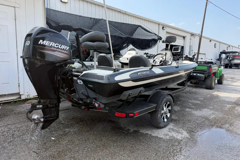Slide: The Image of 2016 Stratos 176 VLO boat with Mercury engine on trailer. - 7