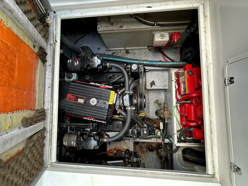 Slide: The Image of Engine compartment of a 1995 Chaparral Signature 310 boat. - 10