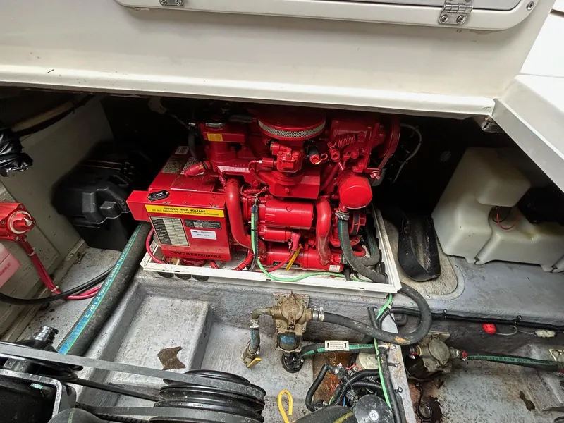 Slide: The Image of Engine compartment of a 1995 Chaparral Signature 310 boat. - 11