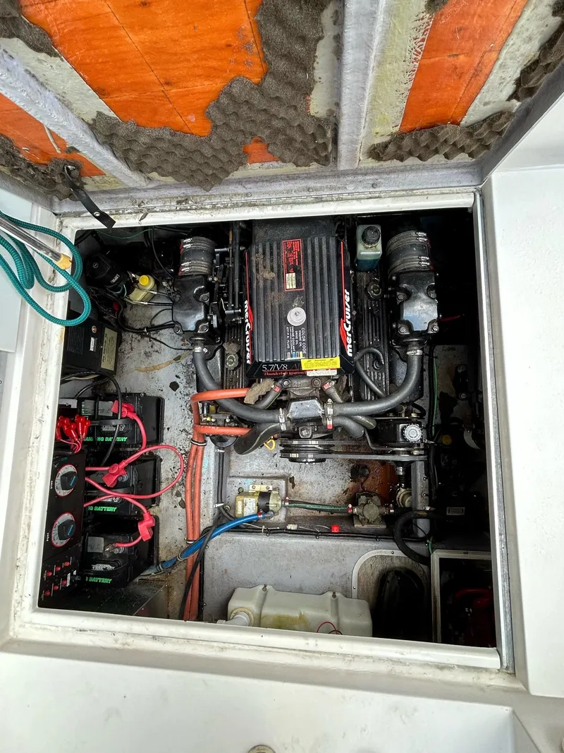 Slide: The Image of Engine compartment of a 1995 Chaparral Signature 310 boat. - 9