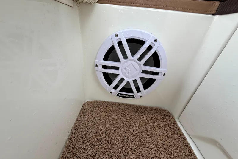 Slide: The Image of Speaker on a 2014 Cobalt 24SD WSS boat, featuring Rockford Fosgate audio system. - 13