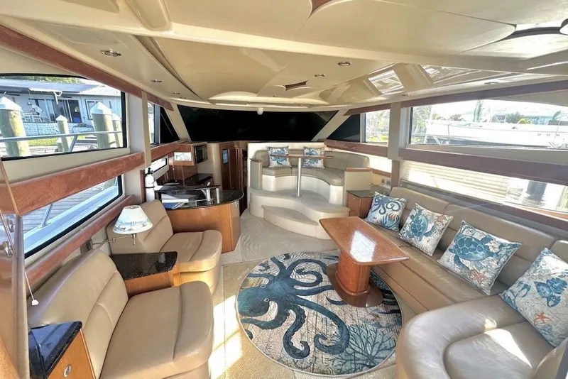 Slide: The Image of Luxurious 2007 Meridan 391 yacht interior with elegant seating and nautical-themed decor. - 2