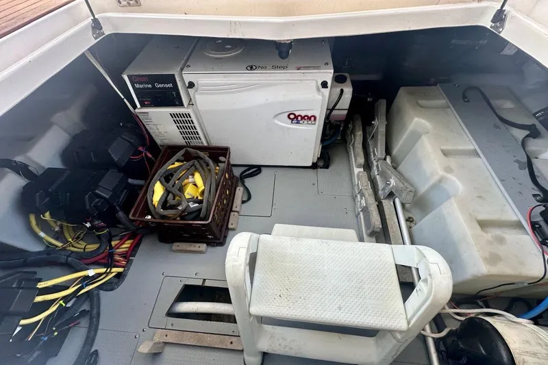 Slide: The Image of Engine compartment of a 2007 Meridan 391 boat with Onan Marine Genset and wiring. - 20