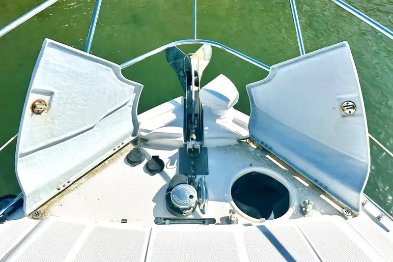 Slide: The Image of Bow of a 2007 Meridan 391 yacht with anchor and storage compartments. - 9
