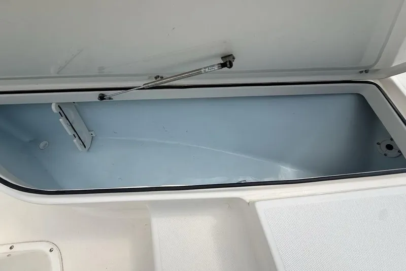 Slide: The Image of Open storage compartment in 2021 Sea Born FX21 Bay boat. - 11