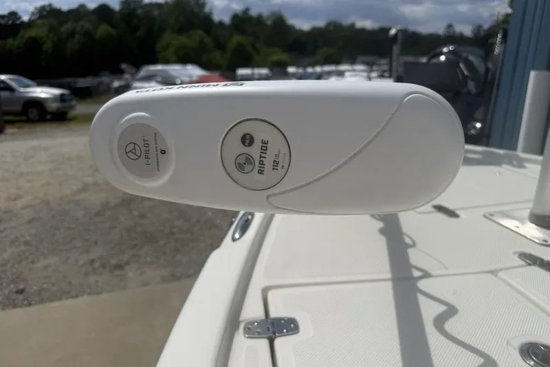 Slide: The Image of Trolling motor on 2021 Sea Born FX21 Bay boat, featuring i-Pilot and Riptide technology. - 13