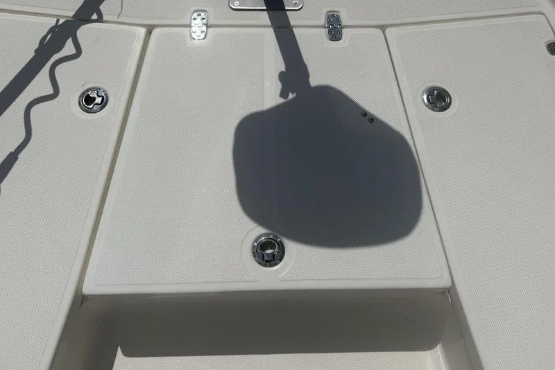 Slide: The Image of 2021 Sea Born FX21 Bay boat deck with shadow and fittings. - 15