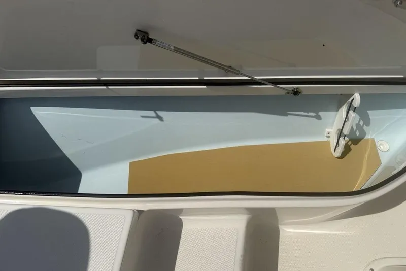 Slide: The Image of Open storage compartment of 2021 Sea Born FX21 Bay boat. - 18