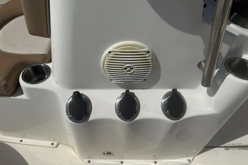 Slide: The Image of 2021 Sea Born FX21 Bay boat console with speaker and cup holders. - 21