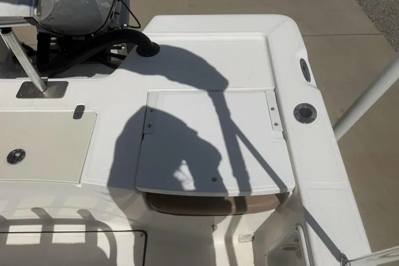 Slide: The Image of 2021 Sea Born FX21 Bay boat deck with shadows and fishing rod holder. - 31